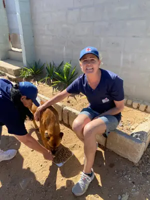 People walking the streets, handing out dog food
